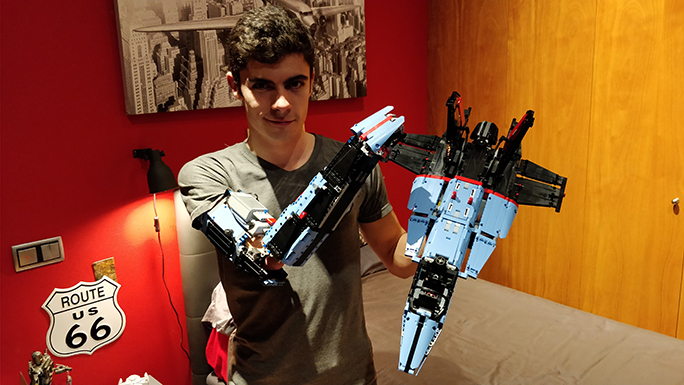 David smiling and showing MK V